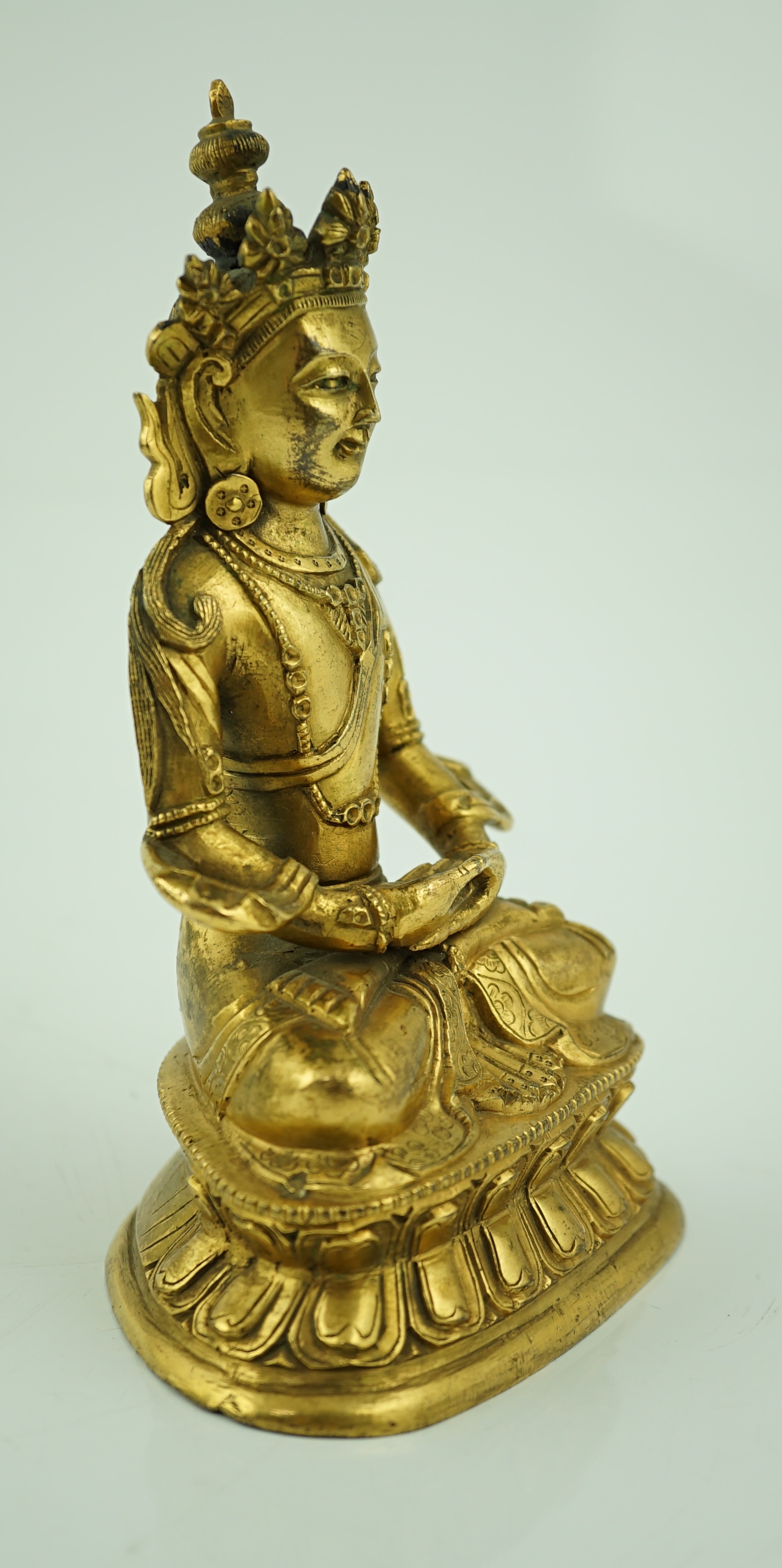 A Tibetan gilt bronze figure of Avalokeshvara, 18th century